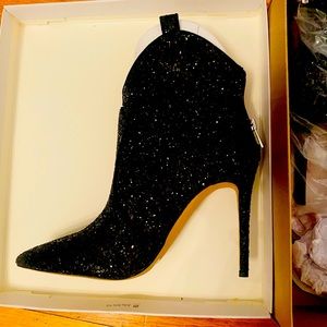 Brand new inbox Jessica Simpson black booties. Size 10.